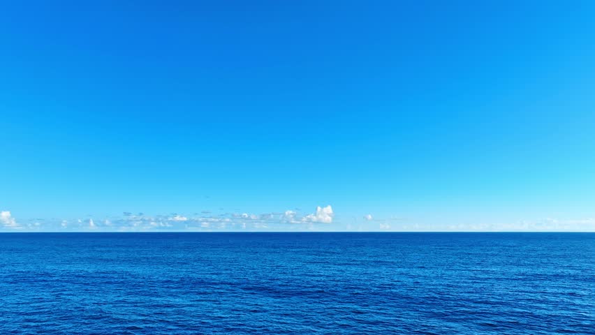 Tropical sea landscape with morning sky background. Pacific ocean blue wave background. Summer seascape. Warm water for swimming outdoors. Sea voyage.