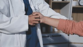 Physical therapists are checking patients elbows at the clinic office room. - Powered by Shutterstock - Get 15% off with code: PIKWIZARD15