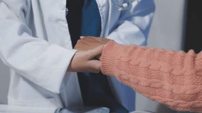 Physical therapists are checking patients elbows at the clinic office room. - Powered by Shutterstock - Get 15% off with code: PIKWIZARD15