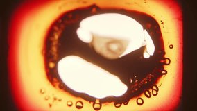 A close-up shot of an old film strip burning from the center, with flames consuming the edges and creating a mesmerizing display of disintegration and decay - Powered by Shutterstock - Get 15% off with code: PIKWIZARD15