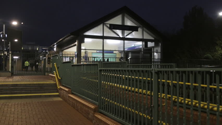 Establishing shot of Hazelhatch train station in Kildare, Ireland at night