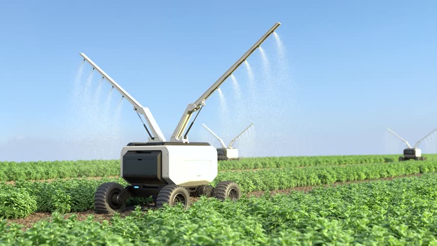 Agricultural robots work in smart farms, Robot spraying fertilizer in the vegetable garden, Smart agriculture farming concept.