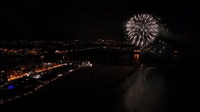 Aerial view of New Year's Fireworks in Algarve region, Portugal. Revelion night celebration - Powered by Shutterstock - Get 15% off with code: PIKWIZARD15