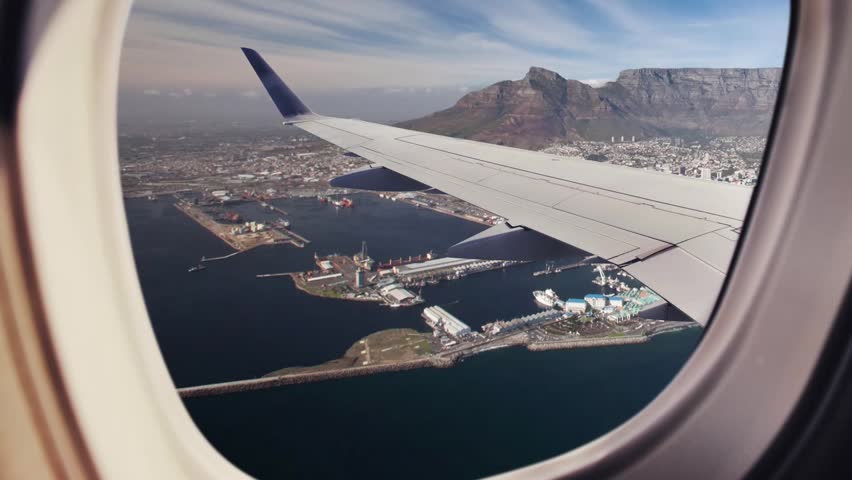 Panoramic aerial view of Cape Town in South Africa. panoramic scene of Cape Town in South Africa seen through the window of an airplane flying over the city