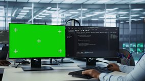 IT specialist in server farm using green screen PC ensuring valuable data remains shielded from threats. Woman safeguarding hardware against unauthorized access using mockup computer, camera B - Powered by Shutterstock - Get 15% off with code: PIKWIZARD15