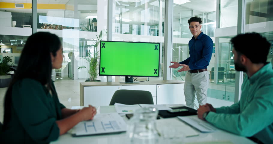 Businessman, meeting or presentation with green screen for business strategy, advertising or marketing at office. Business people, speaker or employees with tracking chromakey display or mockup space