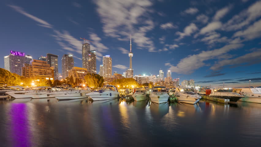 Toronto, Canada city skyline with Harbour front at dawn on Lake Ontario.