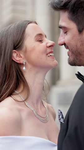 Couple, love or excited for kiss at wedding with commitment, celebration or happy to be bride or groom. Civil union, people or affection at courthouse marriage ceremony with romance, trust or loyalty