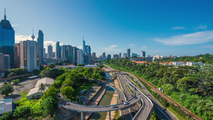 4k Time lapse, Aerial view of traffic on elevated expressway in Kuala Lumpur. Malaysia during daytime and blue sky