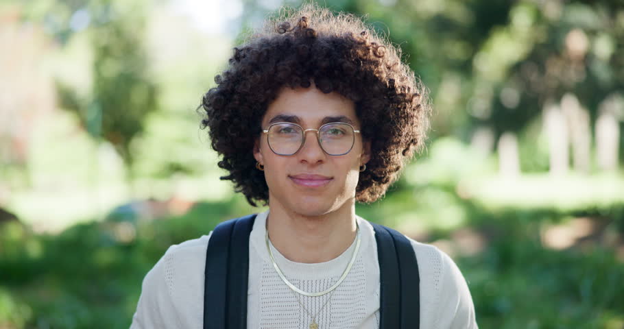 Smile, face and student with man in park for university, learning and education. Youth, scholarship and college with portrait of person and backpack on school campus for knowledge, future or gen z