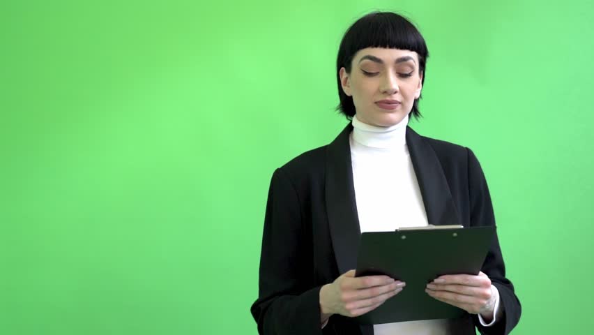 Professional presenter shares insights on green screen techniques in a modern studio setting