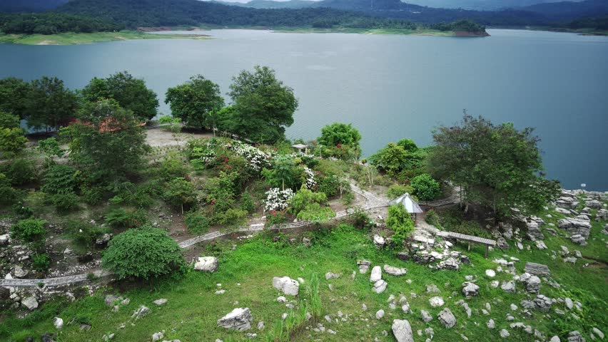 Aerial view landscape forest between water by drone in Wadaslintang, Wonosobo Regency, Central Java