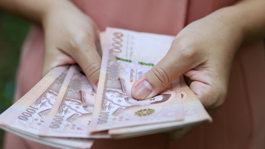 Thai Baht Money Count, Close-up Thai Baht Banknotes in Hand, Business hands Counting Money, Money and financial concepts