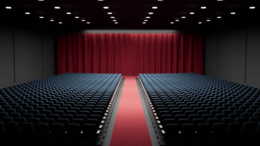 Movie theatre interior. Camera moves from back of auditorium, over red carpet as red curtains open to reveal cinema screen. Includes track points and matte for screen reveal.