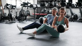 Couple Doing Abdominal Workout In Gym. Fit Athletes - Powered by Shutterstock - Get 15% off with code: PIKWIZARD15