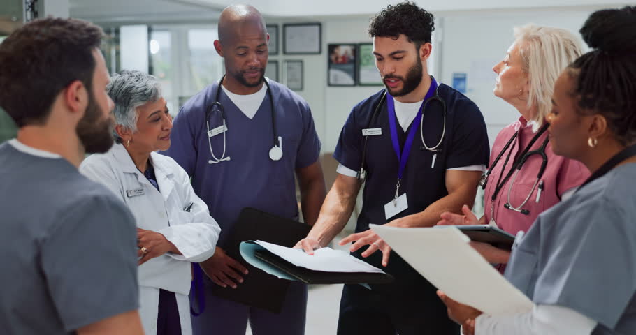 Paperwork, people and medical team planning, discussion and collaboration in hospital. Documents, group and healthcare workers talking, cooperation or nurses meeting with doctor for wellness report