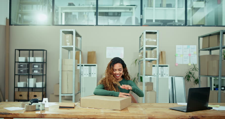 Reversed, packing and woman with logistics at office for small business, dropshipping and delivery. Happy, owner and person wrapping package at desk for supply chain, ecommerce and preparing order