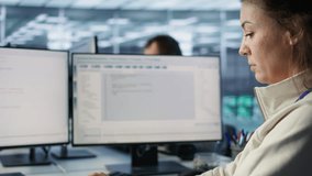 Smiling IT engineer in data center using PC to find misconfigurations affecting rackmounts. Cheerful woman checking servers bottlenecks leading to sluggish data transfer rates, camera B close up - Powered by Shutterstock - Get 15% off with code: PIKWIZARD15