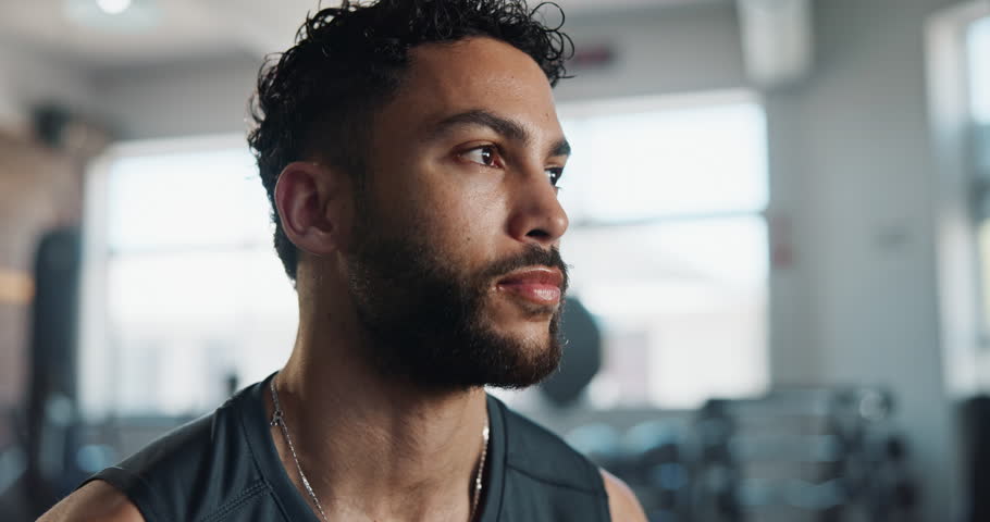 Happy, sports and face of man in gym sweating with workout, bodybuilding and training. Fitness, smile and portrait of male athlete from Thailand with body exercise for wellness in health club.
