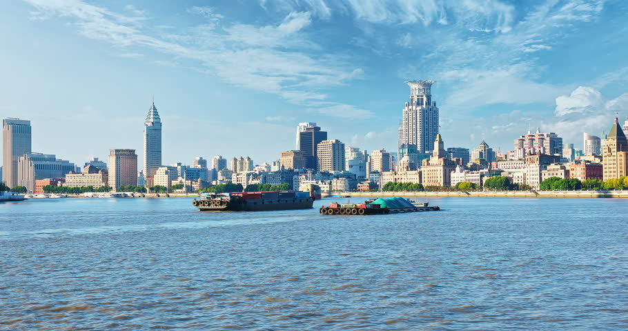 Famous city commercial buildings and river landscape in Shanghai, China