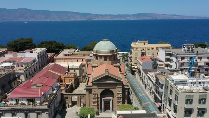 Aerial view of touristic historical central part of Reggio Calabria city and Church of Saint George al Corso on summer sunny day, Italy, Europe