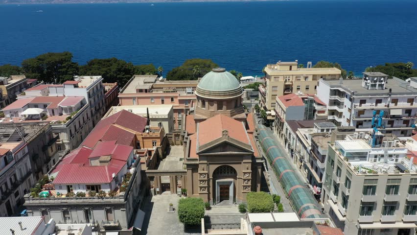 Aerial view of touristic historical central part of Reggio Calabria city and Church of Saint George al Corso on summer sunny day, Italy, Europe