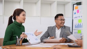 Efficient teamwork among professionals fosters collaboration and communication through in depth discussion, analysis of data and charts, driving modern office productivity. - Powered by Shutterstock - Get 15% off with code: PIKWIZARD15