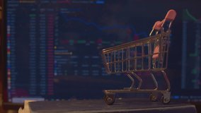 Modern economy. Business concept. A small empty shopping cart stands against the background of a computer monitor on which economic data is changing. Close-up. Shallow depth of field. - Powered by Shutterstock - Get 15% off with code: PIKWIZARD15