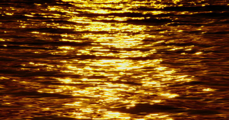 Golden Water surface reflection at sunset. Shot on cinema cam high quality (DCI4K 4096x2160p. ProRes422)