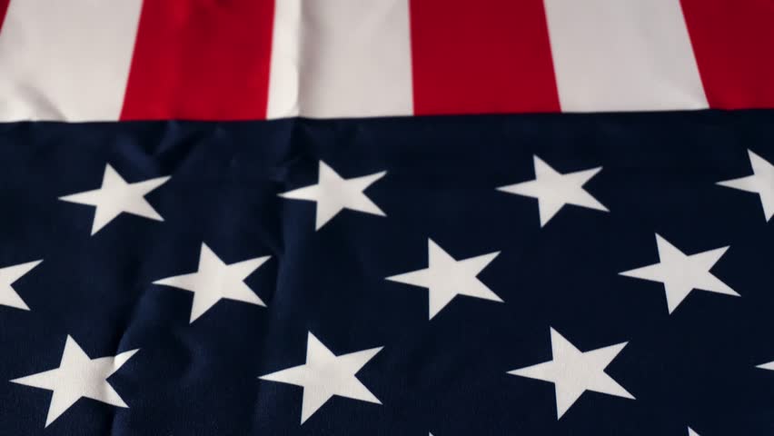 Vertical tracking of an US American flag, Stars fragment. USA Flag. Footage for Election day, 4th of July, Memorial Day or Veteran's Day