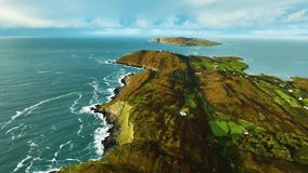 An aerial view reveals a stunning coastline with lush greenery and captivating ocean waves - Powered by Shutterstock - Get 15% off with code: PIKWIZARD15