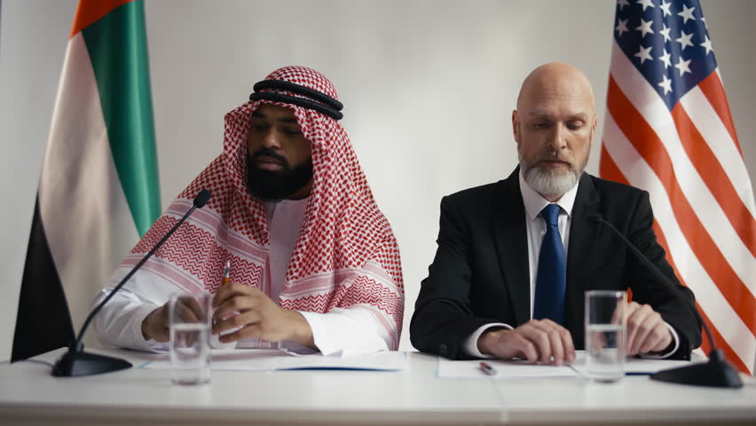 UAE and USA politicians answering questions at press conference, giving comments