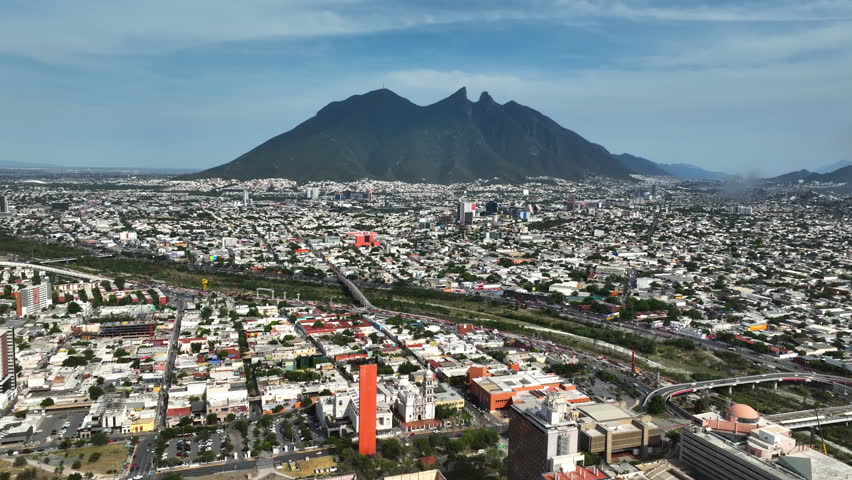 Aerial view over the Monterrey city, toward the Saddle Hill mountain in Mexico
