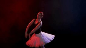 Romantic ballet performance, exam or concert in school of arts, ballerina dance . Beautiful ballet dancer girl moving slowly in darkness, mysterious and dramatic shot in dark studio, classic ballet - Powered by Shutterstock - Get 15% off with code: PIKWIZARD15
