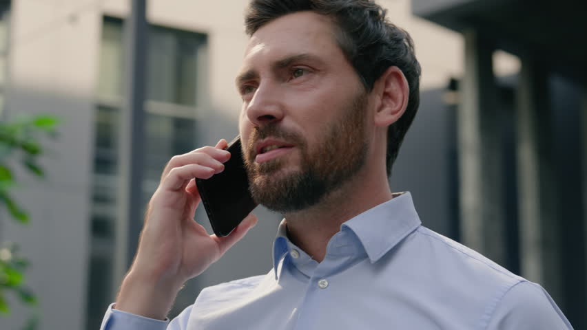 Smartphone chatting talking telephone Caucasian businessman employer middle-aged man business male adult guy entrepreneur investor salesman in city talk chat mobile phone outdoors distant negotiation - Powered by Shutterstock - Get 15% off with code: PIKWIZARD15