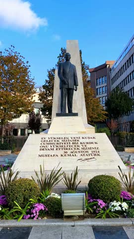 Kadikoy Turkey 3 Nov 2024: Majestic Statue of Mustafa Kemal Ataturk in City Square. bronze statue of Mustafa Kemal Ataturk, the founder of the Republic of Turkey stands tall in a city square 4k fullhd