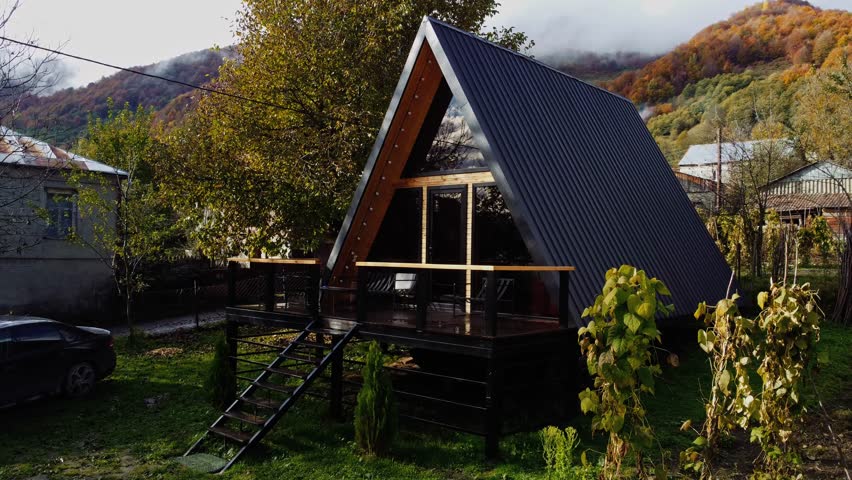 Drone View of Stylish A-Frame Cabin in Racha’s Mountain Wilderness
