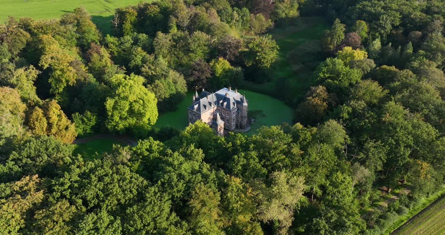Moersbergen castle estate, Utrechtse Heuvelrug, at the transition to the Kromme Rijn area. Middle ages castle. Aerial drone video.