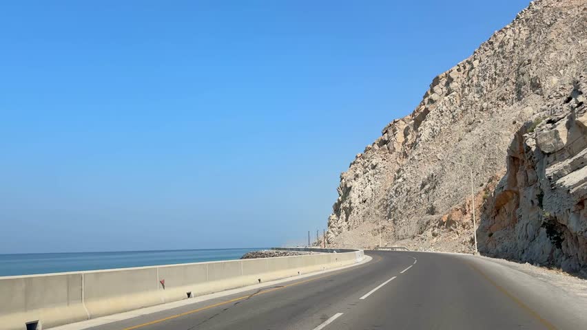 Scenic coastal road along the cliffs of Musandam, Oman