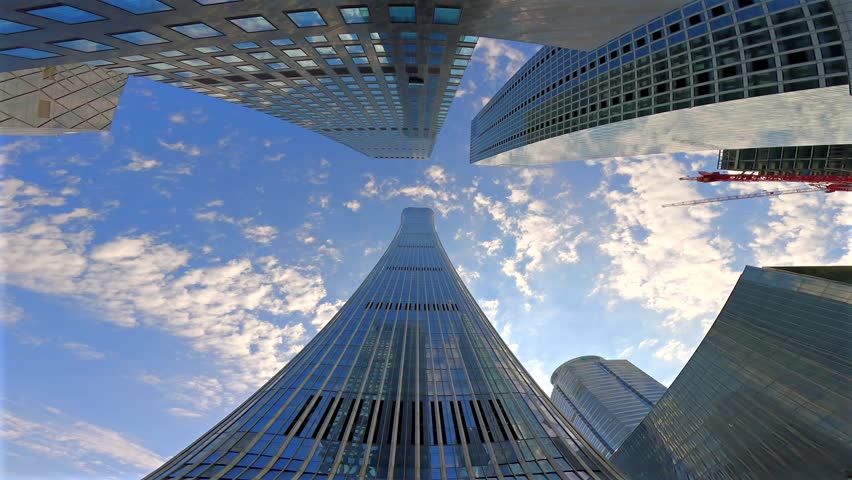 Looking up at the high-rise buildings in the city, the development of Chinese cities，High rise urban buildings, modern high-end office buildings, and commercial office buildings in Beijing, China