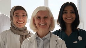 Workforce ready for medical service with trust in line standing at hospital, collaboration at clinic and working in medicine as diverse team. Portrait of healthcare workers showing success and trust - Powered by Shutterstock - Get 15% off with code: PIKWIZARD15