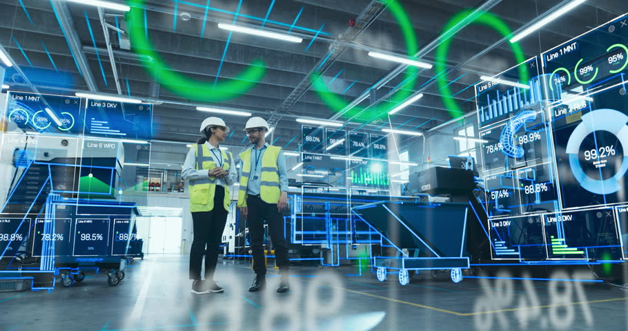 Engineers Analyze Data in a Smart Factory Using Augmented Reality Software. Advanced Manufacturing Facility Shows Industry 4.0 Technologies, Optimizing Production Processes Through Digital Integration