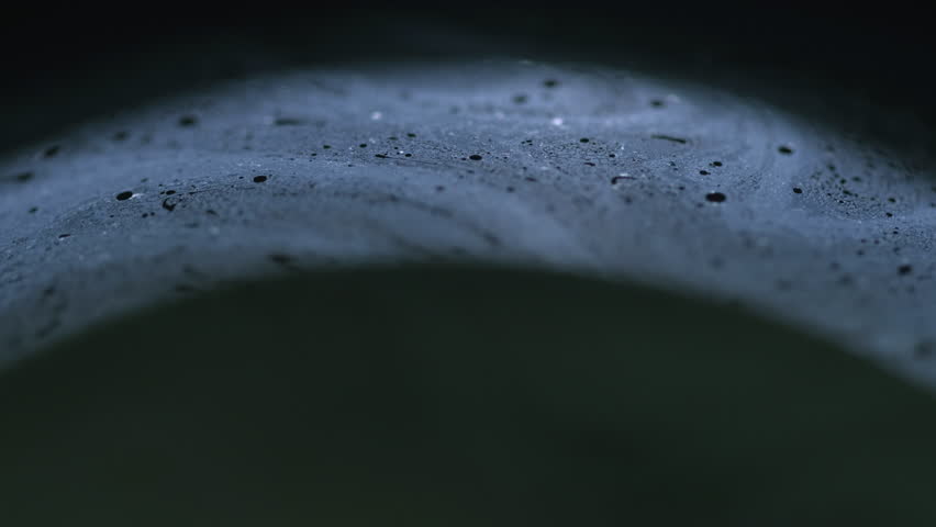 Ice texture. Broken hollows. Set of caves in pure transparent crushed frost with cracks on contemporary art black darkened background.