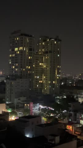 Vietnam Ho Chi Minh Saigon night city fireworks Celebration day. Skyline with fireworks light up sky over landmark skyscraper celebrating New year and tet holiday