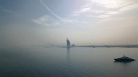 Marvel at Dubai's stunning skyline! Witness iconic skyscrapers like the Burj Khalifa, luxurious hotels, and futuristic architecture that define this dynamic, world-famous cityscape. - Powered by Shutterstock - Get 15% off with code: PIKWIZARD15