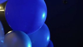 An enchanting mix of blue and white balloons float peacefully under soft light, creating a lively atmosphere perfect for parties, gatherings, and celebrations. Lets celebrate with joy and festivity - Powered by Shutterstock - Get 15% off with code: PIKWIZARD15