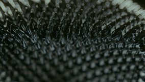A slow-motion macro footage of the ferrofluid magnetic liquid in motion, with blurred background - Powered by Shutterstock - Get 15% off with code: PIKWIZARD15