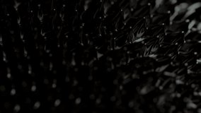 A macro footage of the magnetic ferrofluid liquid in motion, with a blurred background - Powered by Shutterstock - Get 15% off with code: PIKWIZARD15