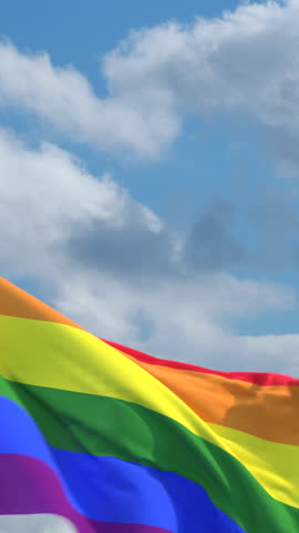 Looping Rainbow flag on flagpole