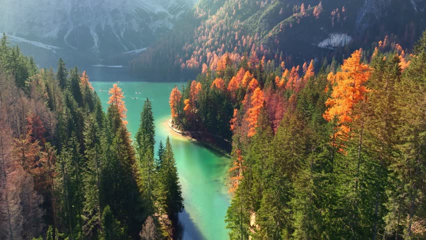 Autumn Aerial View of Lake Braies in Dolomiti Alps in Italy. Alps in Italy on a sunny day in autumnal famous travel destination in the Dolomites, Lago di Braies in the fall